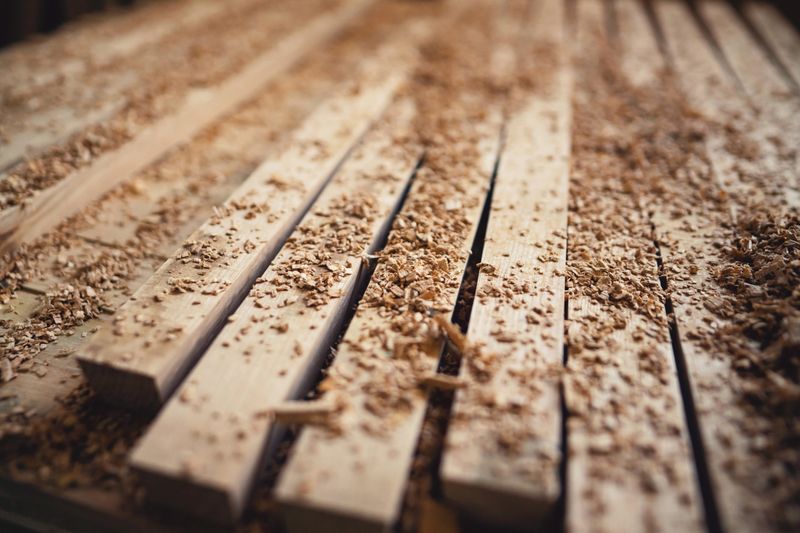 Stacked oak wooden steves at the barrel workshop