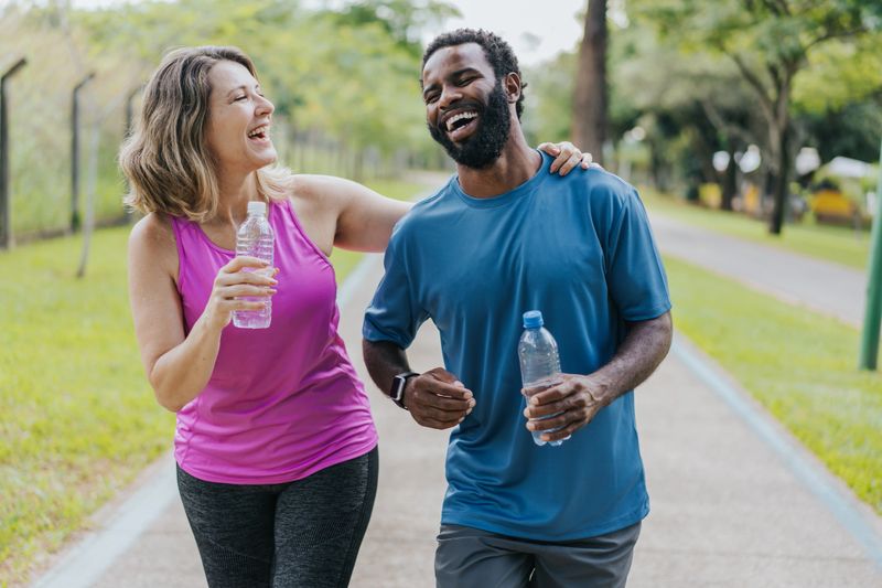 Relaxed couple of friends during physical exercise