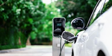 Electric car charging outdoors.