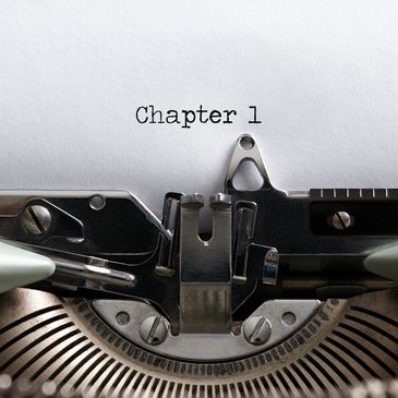 Close up of old fashioned typewriter with the words Chapter 1
