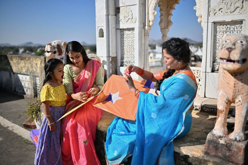 Makar Sankranti is an Indian Hindu festival dedicated to the solor deity and is observed to mark a new beginning. It is celebrated by making sesame sweets and kite flying. Photographed in Palace in Rajasthan.