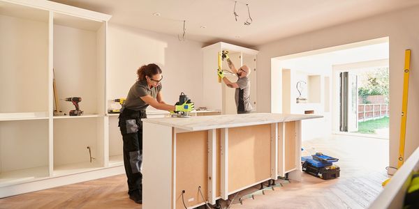 Contractor installing a new kitchen