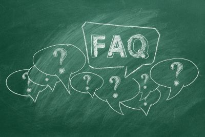 FAQ and question marks drawn on a chalkboard.