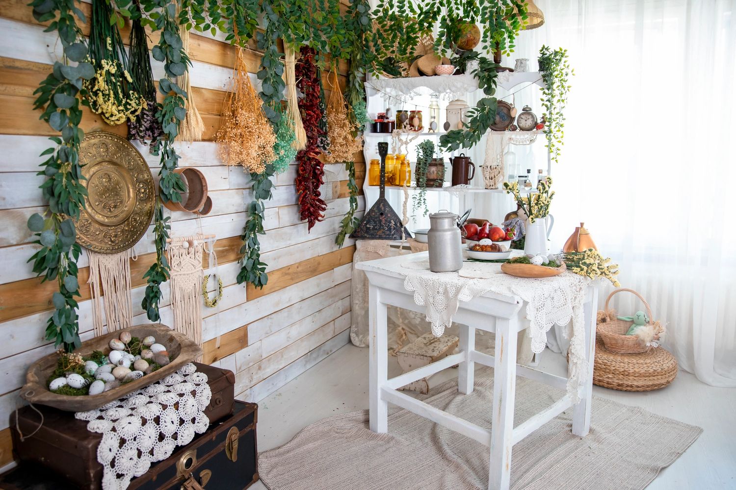 Stack of books next to pencils in a holder and a camera.