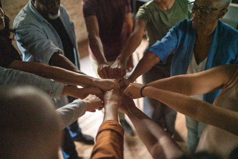 Team doing fist bump