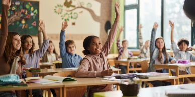 Students eagerly raise hands because it's Back to School time | VisitBronzeville