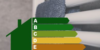 Energy efficiency rating chart over a towel on a radiator.