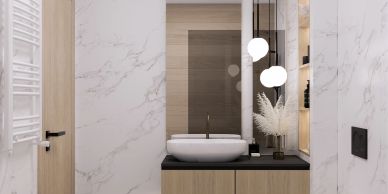 Modern bathroom vanity with vessel sink and hanging lights.