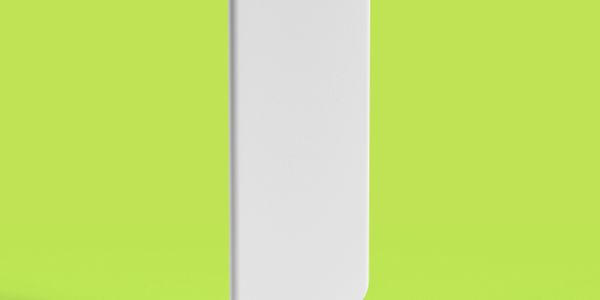 White smartphone on a bright green background.