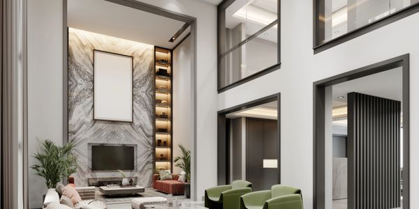 Modern living room with high ceilings, elegant marble wall, and stylish seating.
