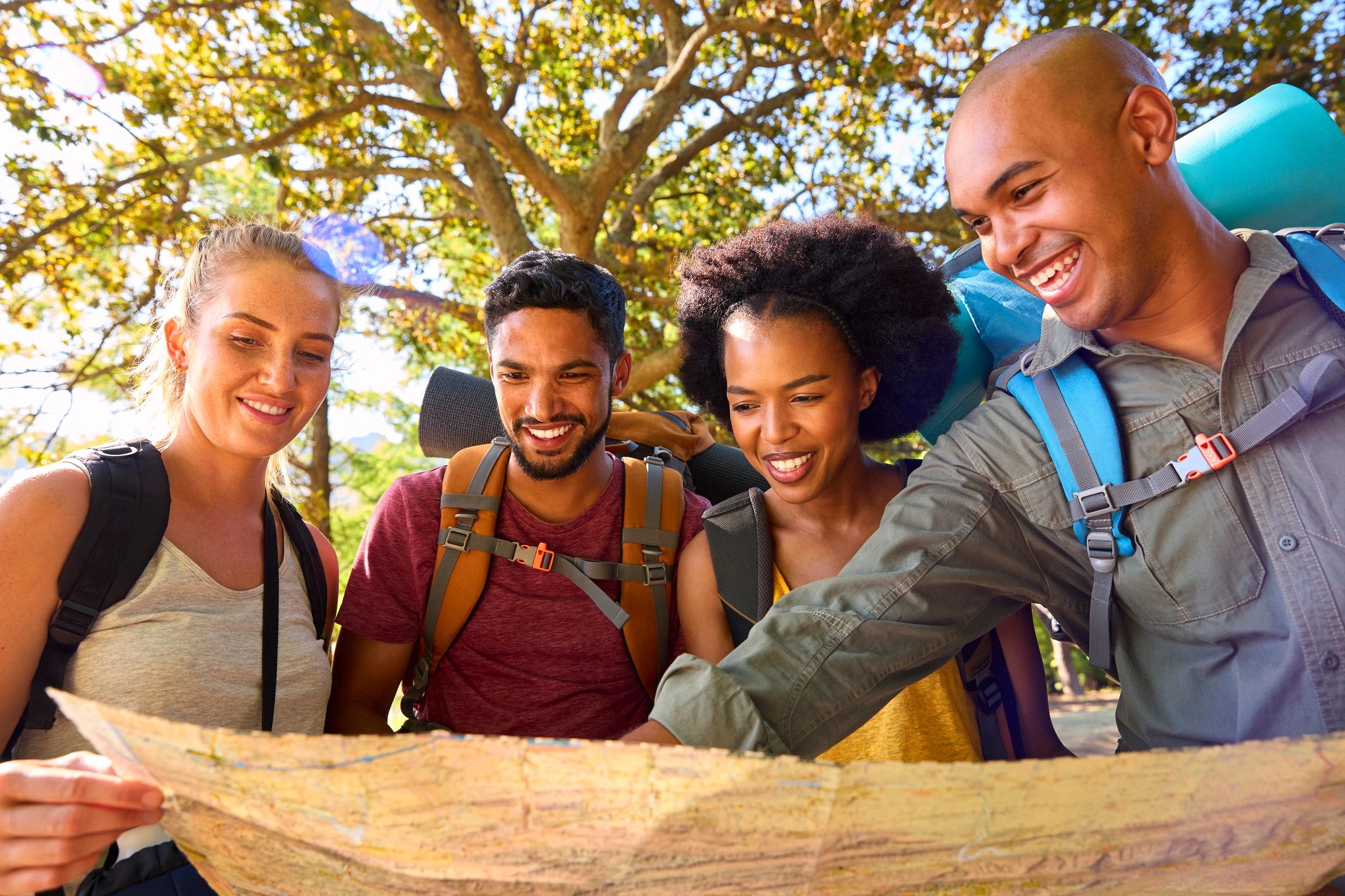 Diverse group looking at a map
