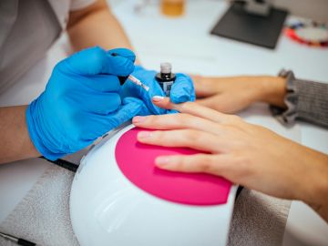 Nail polish removal with gentle soak-off process.