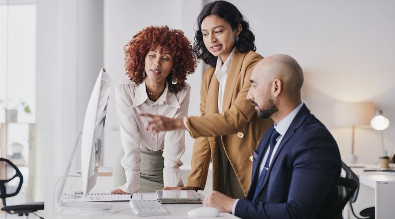Administration computer, collaboration or business people point at financial diversity funding, finance or online accounting. Fintech database, data analysis or accountant teamwork on bank compliance