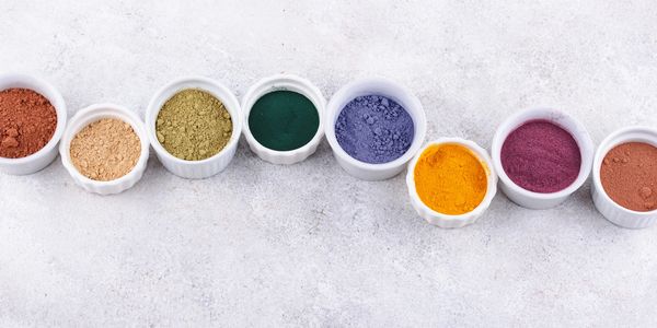 Natural colours of powders we use to craft bespoke supplements.