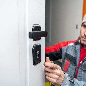 Stressed man looking into a car through an open window.