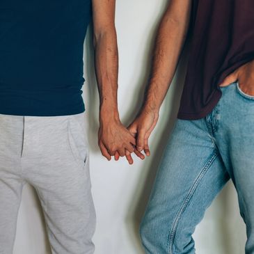 Two people holding hands.