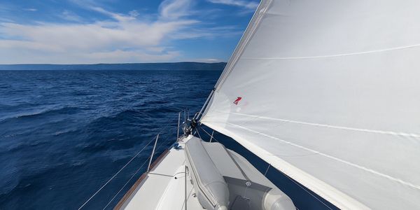 Sunset Seas Yacht Collection Sailing Yacht on water