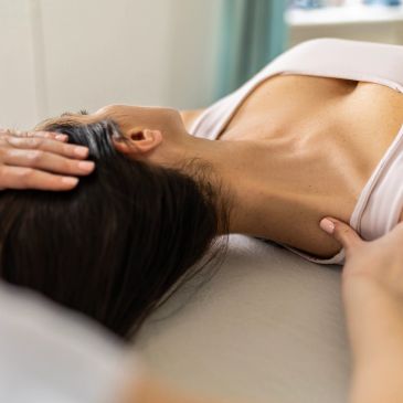 Person receiving a neck massage.