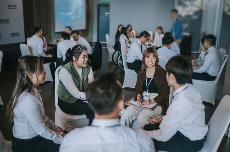 diverse group meeting and discuss or brainstorm business strategy with post note. Workshop for startup team in workshop