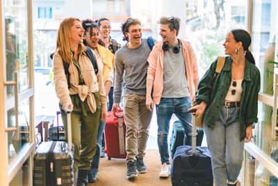 Group of holiday makers smiling and laughing