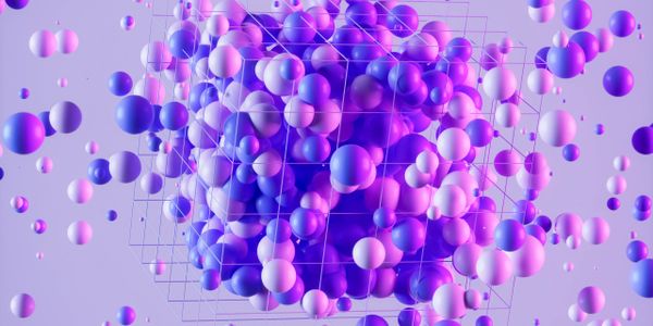 Abstract 3D purple and pink spheres with a wireframe cube on a light background.