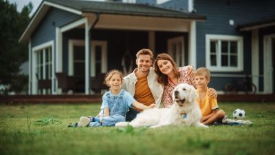 Child and dog sharing space safely with adult supervision