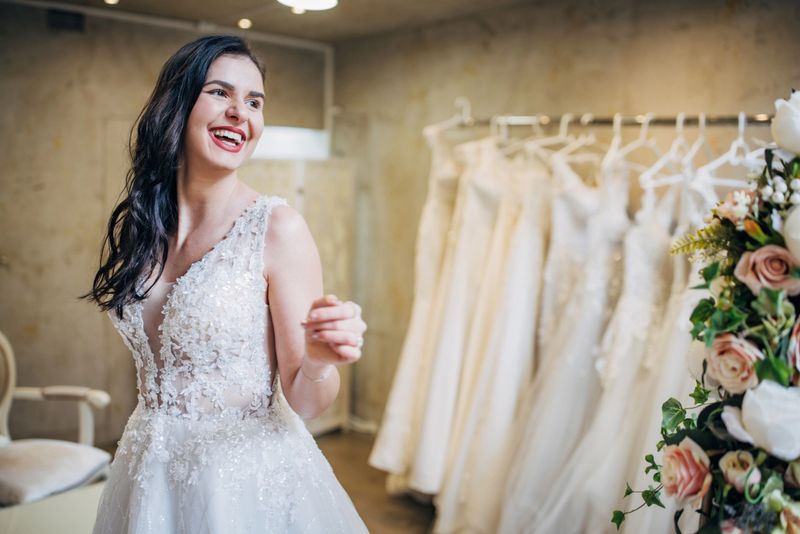 Bride trying out wedding dressing the bridal shop