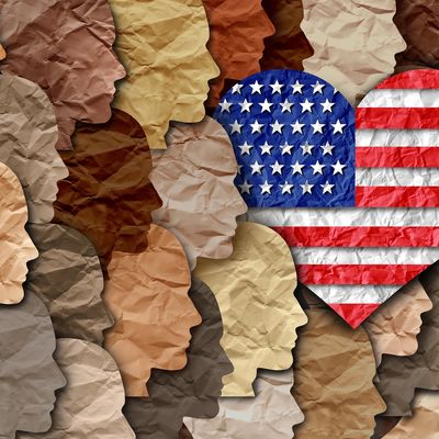 Diverse faces surrounding a heart with the American flag, symbolizing unity and patriotism.
