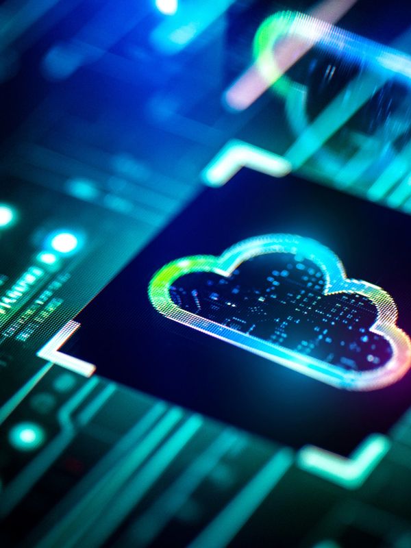 Glowing cloud icon on a futuristic digital circuit board.