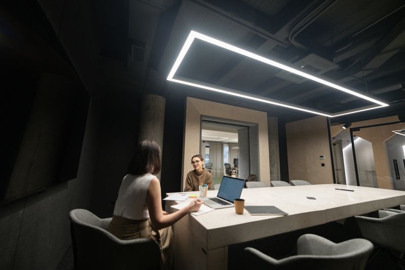 Photo of a young woman having a job interview. The female hiring manager is interviewing her.