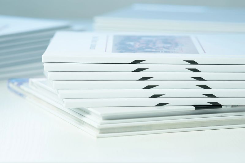 stack of photo books close-up, partial blur
