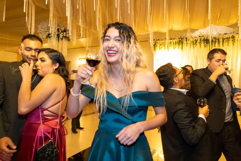 Young woman happy to have finished her degree and to be celebrating