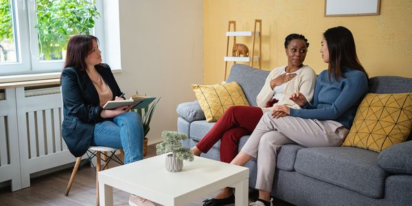 Parents/Caregivers receiving parenting support from a counsellor.
