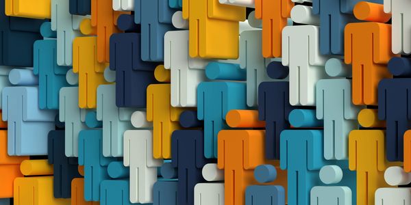 Group of human figurines in multiple colors.