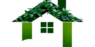 Green house icon with leafy roof symbolizing eco-friendly living.