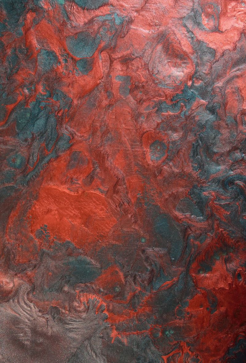 abstract red-black lava-like background with fine glitter