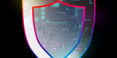 Two Overlapping Digital Shields with Circuit Patterns Symbolize High Security Protection.