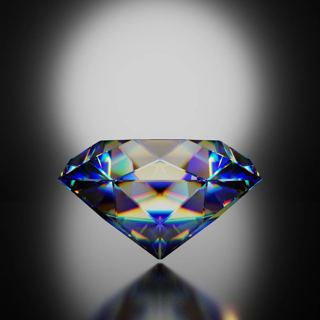 A shining diamond reflecting colorful light on a dark gradient background.