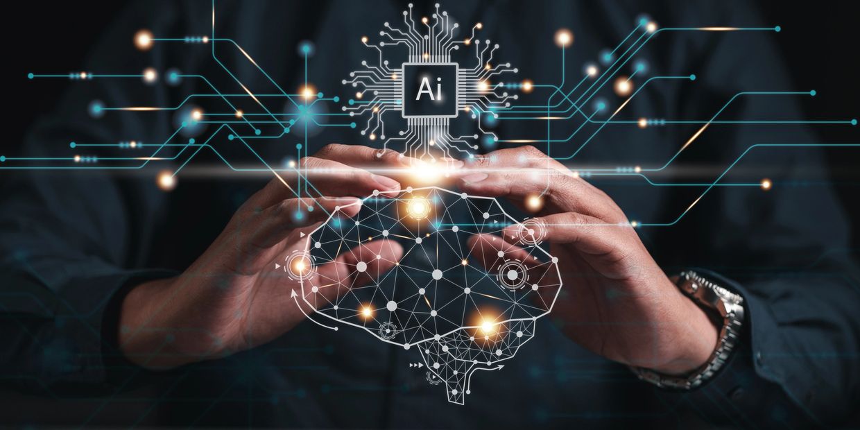 Hands protecting a digital AI brain with connecting circuits.