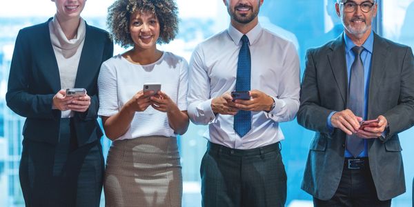 Disassembled laptop showing circuit boards and hard drive.