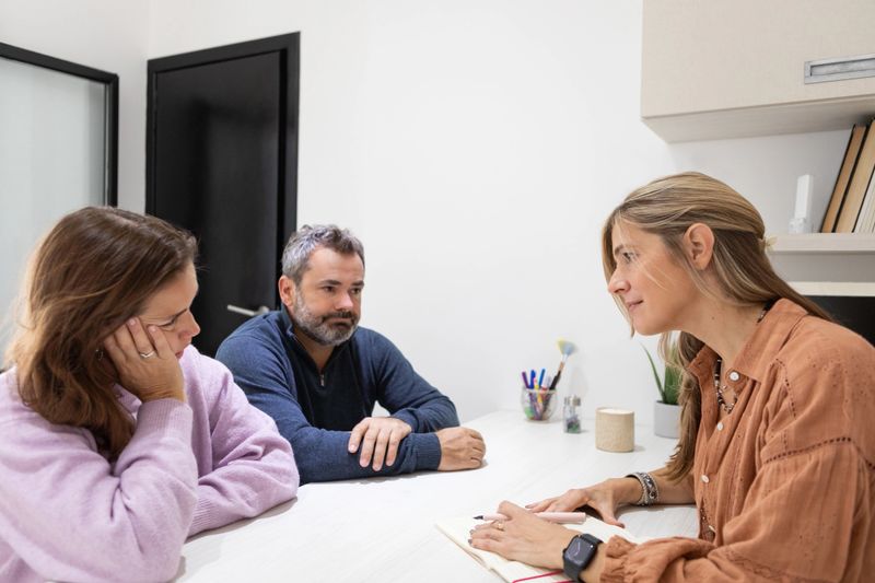 Argentinean middle age heterosexual couple during couple therapy with female psychologist - Mental Health - Buenos Aires - Argentina