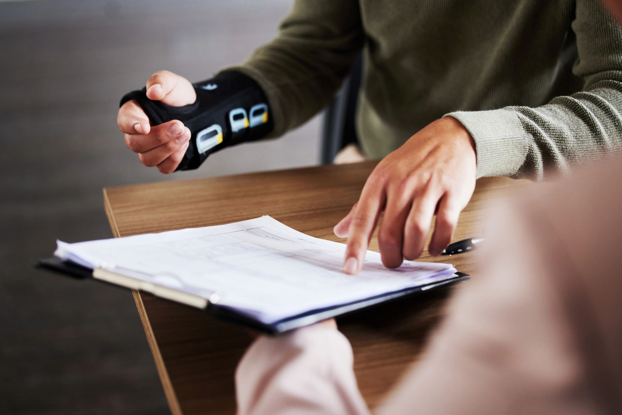 Injured person consulting personal injury lawyer in Florence AL for compensation after accident.