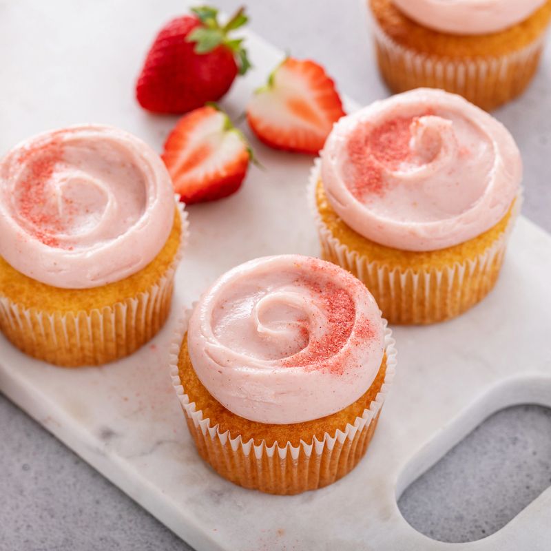 Strawberry lemonade cupcakes with a swirl of strawberry cream cheese frosting