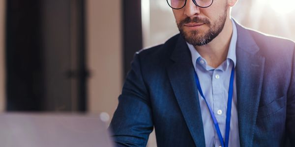  A man working on a laptop