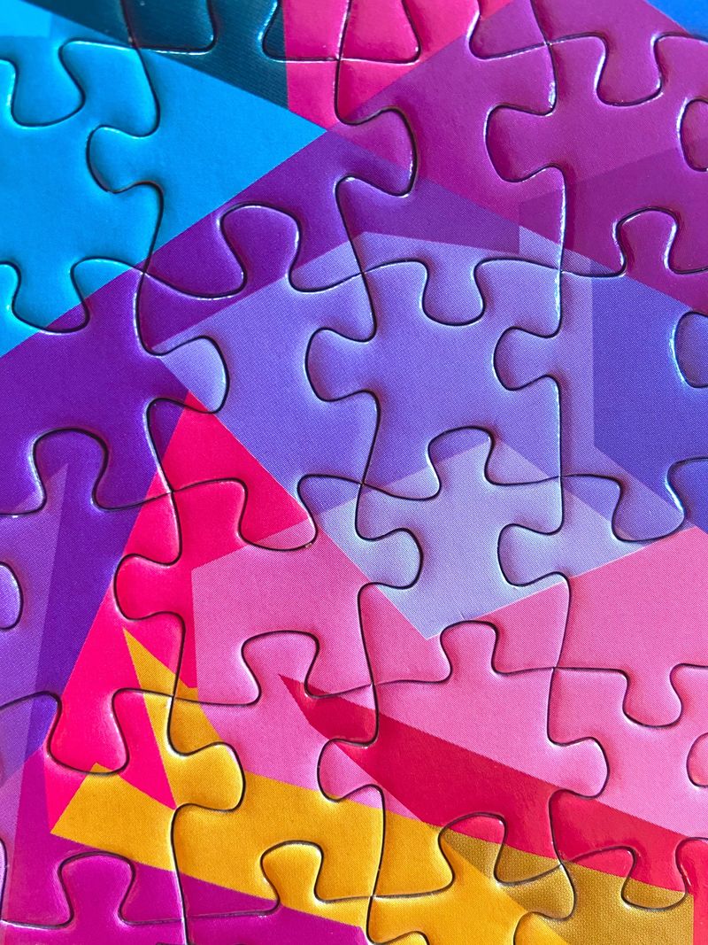 A close up view of connected puzzle pieces.