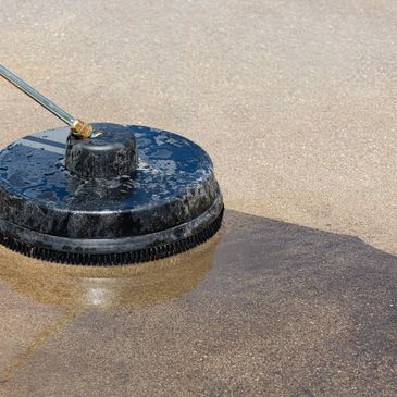 cleaning a dirty driveway