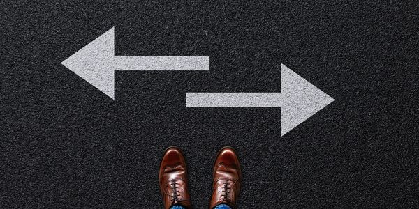 Birds eye view of shoes and left and right arrows.