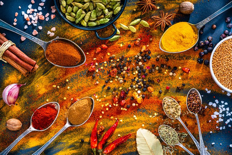 Abstract background of colorful spices shot from above