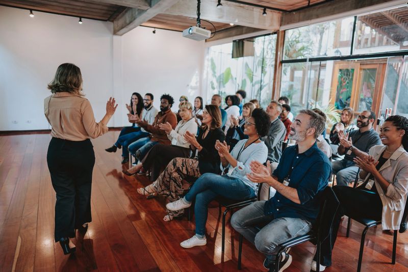 Woman presenting at a conference