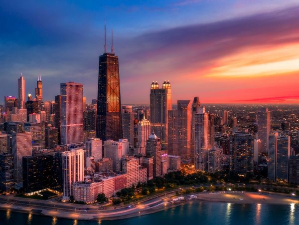 A view of the Chicago skyline at sunset.